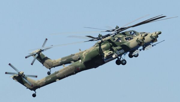 Вертолеты Ми-28 над полигоном Кадамовский в Ростовской области. Архивное фото Вертолеты Ми-28 над полигоном Кадамовский в Ростовской области. Архивное фото