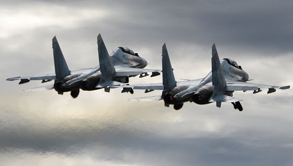 Многоцелевые истребители Су-30СМ пилотажной группы Соколы России. Архивное фото Многоцелевые истребители Су-30СМ пилотажной группы Соколы России. Архивное фото