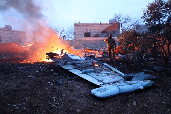 Обломки сбитого боевиками российского самолета Су-25 в Сирии. 3 февраля 2018 Обломки сбитого боевиками российского самолета Су-25 в Сирии. 3 февраля 2018
