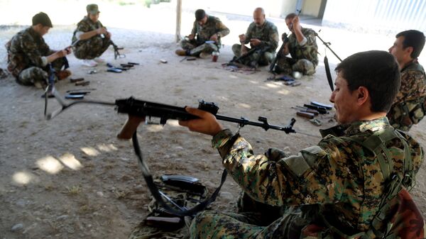 Бойцы отряда народной самообороны курдов (YPG) . Архивное фото Бойцы отряда народной самообороны курдов (YPG) . Архивное фото