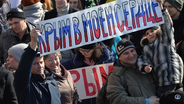 Участники митинга, посвященного годовщине воссоединения Крыма с Россией, во Владивостоке. 18 марта 2018 Участники митинга, посвященного годовщине воссоединения Крыма с Россией, во Владивостоке. 18 марта 2018