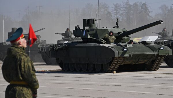 Танк Т-14 Армата во время репетиции парада Победы на военном полигоне Алабино. 9 апреля 2018 Танк Т-14 Армата во время репетиции парада Победы на военном полигоне Алабино. 9 апреля 2018