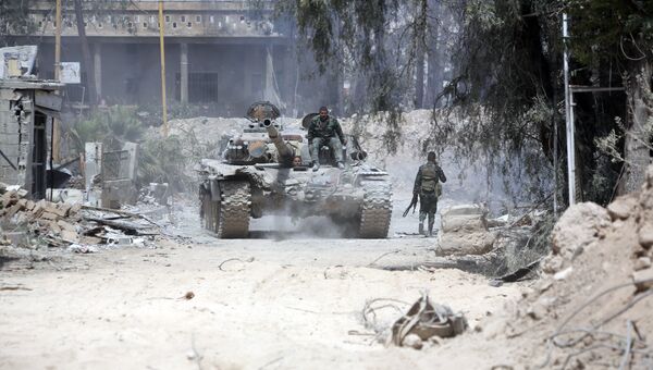 Солдаты Сирийской армии на восточной окраине Думы. Архивное фото Солдаты Сирийской армии на восточной окраине Думы. Архивное фото