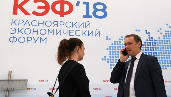 Символика Красноярского экономического форума 2018 в павильоне Международного выставочно-делового центра Сибирь в Красноярске. 11 апреля 2018 Символика Красноярского экономического форума 2018 в павильоне Международного выставочно-делового центра Сибирь в Красноярске. 11 апреля 2018