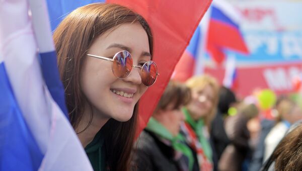 Участники первомайской демонстрации на Красной площади в Москве Участники первомайской демонстрации на Красной площади в Москве