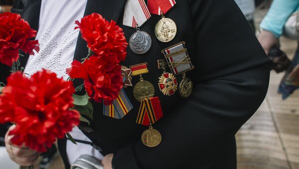 Участник акции Бессмертный полк Участник акции Бессмертный полк