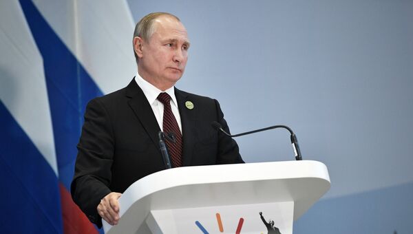 Президент РФ Владимир Путин во время пресс-конференции по итогам саммита лидеров БРИКС в Йоханнесбурге. 27 июля 2018 Президент РФ Владимир Путин во время пресс-конференции по итогам саммита лидеров БРИКС в Йоханнесбурге. 27 июля 2018