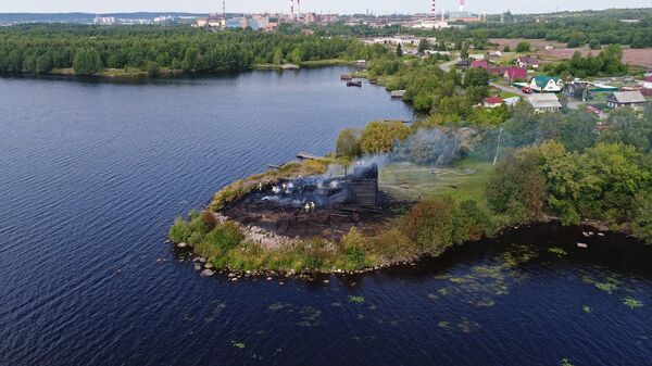 Сгоревшее здание церкви Успения Божией Матери в Кондопоге в Карелии. 10 августа 2018 Сгоревшее здание церкви Успения Божией Матери в Кондопоге в Карелии. 10 августа 2018