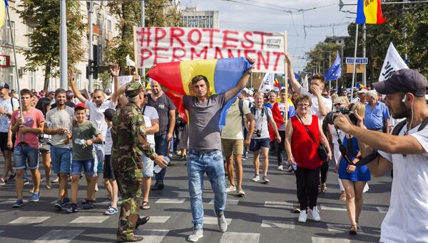 Участники акции протеста в Кишиневе. Архивное фото Участники акции протеста в Кишиневе. Архивное фото