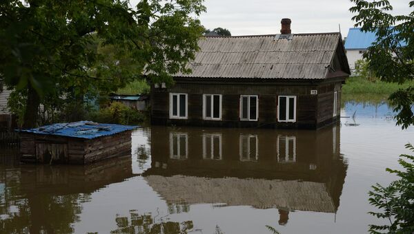 Здание, затопленное в результате паводка Здание, затопленное в результате паводка