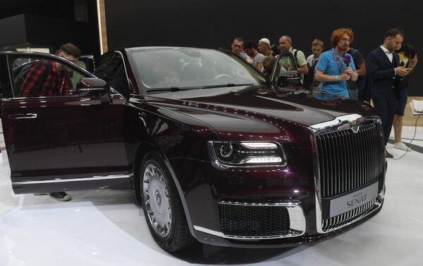 Журналисты на презентации автомобиля Aurus Senat на Московском международном автомобильном салоне 2018 Журналисты на презентации автомобиля Aurus Senat на Московском международном автомобильном салоне 2018