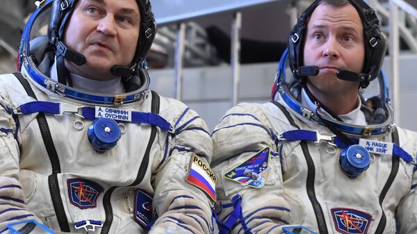Космонавт Роскосмоса Алексей Овчинин и астронавт НАСА Ник Хейг. Архивное фото Космонавт Роскосмоса Алексей Овчинин и астронавт НАСА Ник Хейг. Архивное фото