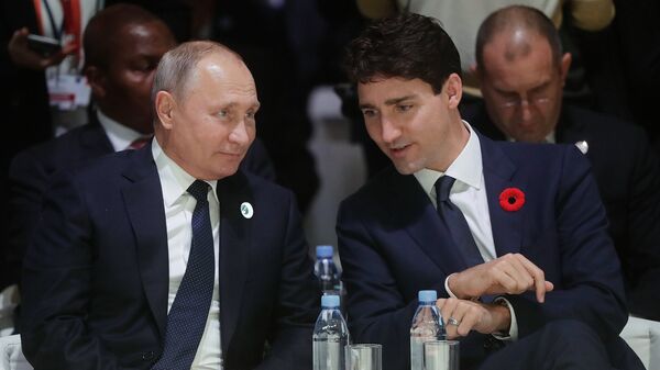 Президент РФ Владимир Путин и премьер-министр Канады Джастин Трюдо на Парижском форуме мира. 11 ноября 2018 Президент РФ Владимир Путин и премьер-министр Канады Джастин Трюдо на Парижском форуме мира. 11 ноября 2018