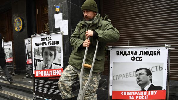 Акция националистической организации С14 (экстремистская организация, запрещенная в России) с требованием отставки генпрокурора перед зданием Генеральной прокуратуры в Киеве Акция националистической организации С14 (экстремистская организация, запрещенная в России) с требованием отставки генпрокурора перед зданием Генеральной прокуратуры в Киеве