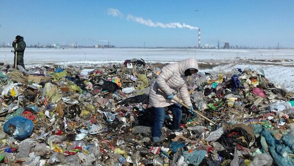 Поиски тела ребенка на городской свалке Поиски тела ребенка на городской свалке