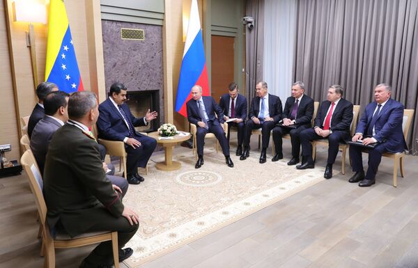 Президент РФ Владимир Путин и президент Венесуэлы Николас Мадуро во время встречи. 5 декабря 2018 Президент РФ Владимир Путин и президент Венесуэлы Николас Мадуро во время встречи. 5 декабря 2018