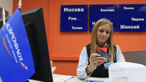 В офисе продаж авиабилетов компании Аэрофлот - Российские авиалинии В офисе продаж авиабилетов компании Аэрофлот - Российские авиалинии
