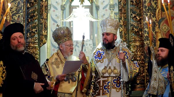 Вселенский Патриарх Варфоломей и митрополит Епифаний во время службы в Георгиевском соборе Вселенского патриархата в Стамбуле, Турция. 6 января 2019 Вселенский Патриарх Варфоломей и митрополит Епифаний во время службы в Георгиевском соборе Вселенского патриархата в Стамбуле, Турция. 6 января 2019