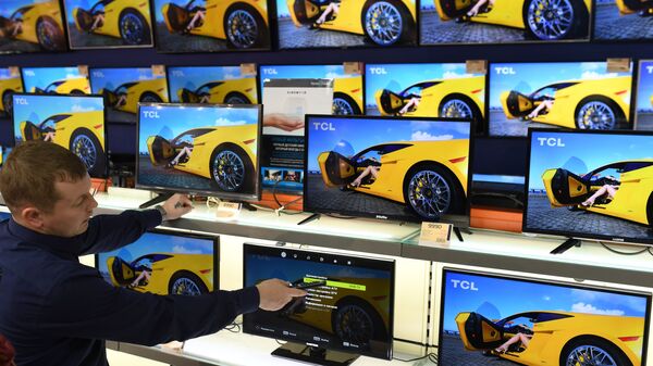 Телевизоры в магазине электроники Телевизоры в магазине электроники