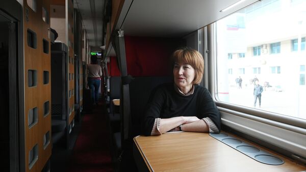 Пассажиры в модернизированном плацкартном вагоне, первый рейс которого пройдет по маршруту Ростов-на-Дону - Москва Пассажиры в модернизированном плацкартном вагоне, первый рейс которого пройдет по маршруту Ростов-на-Дону - Москва