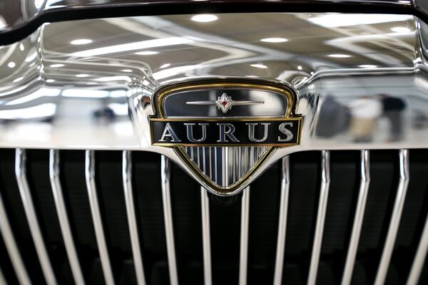 Шильдик автомобиля Aurus в Государственном научном центре РФ ФГУП НАМИ Шильдик автомобиля Aurus в Государственном научном центре РФ ФГУП НАМИ
