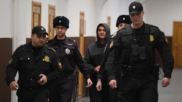 Бывший генеральный директор компании Региональные электрические сети Сергей Ильичев, обвиняемый в хищении 4 миллиардов рублей, перед началом заседания суда. 5 апреля 2019