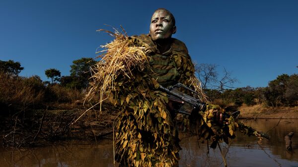 Akashinga - the Brave Ones фотографа Brent Stirton, занявшего первое место в категории ENVIRONMENT - SINGLES в фотоконкурсе World Press Photo 2019 Akashinga - the Brave Ones фотографа Brent Stirton, занявшего первое место в категории ENVIRONMENT - SINGLES в фотоконкурсе World Press Photo 2019