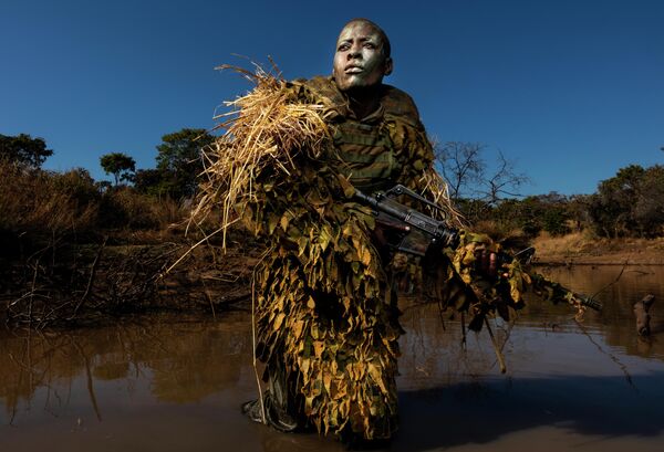 Akashinga - the Brave Ones фотографа Brent Stirton, занявшего первое место в категории ENVIRONMENT - SINGLES в фотоконкурсе World Press Photo 2019 Akashinga - the Brave Ones фотографа Brent Stirton, занявшего первое место в категории ENVIRONMENT - SINGLES в фотоконкурсе World Press Photo 2019