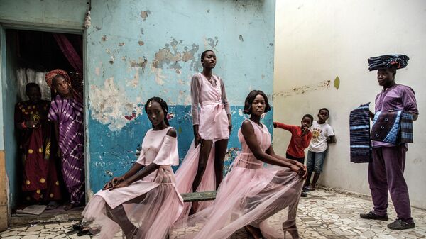 Dakar Fashion фотографа Finbarr O'Reilly, занявшего первое место в категории PORTRAITS - SINGLES в фотоконкурсе World Press Photo 2019 Dakar Fashion фотографа Finbarr O'Reilly, занявшего первое место в категории PORTRAITS - SINGLES в фотоконкурсе World Press Photo 2019