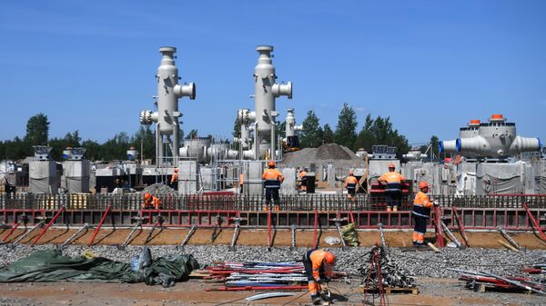 Рабочие на участке строительства газопровода Северный поток-2 в Ленинградской области Рабочие на участке строительства газопровода Северный поток-2 в Ленинградской области