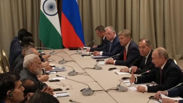 Беседа президента России Владимира Путина с премьер-министром Индии Нарендрой Моди. Гостиница Hyatt Regency Bishkek. Киргизия. Беседа президента России Владимира Путина с премьер-министром Индии Нарендрой Моди. Гостиница Hyatt Regency Bishkek. Киргизия.