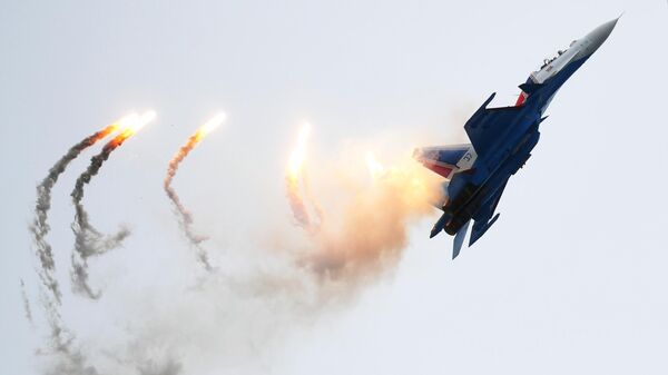 Самолет Су-30СМ пилотажной группы Русские витязи на Международном военно-техническом форуме Армия-2019 Самолет Су-30СМ пилотажной группы Русские витязи на Международном военно-техническом форуме Армия-2019