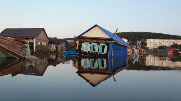 Унесенный паводком дом в городе Тулун в Иркутской области
