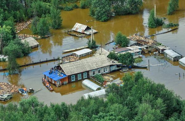 Затопленные дома в селе Норск в Селемджинском районе Амурской области Затопленные дома в селе Норск в Селемджинском районе Амурской области