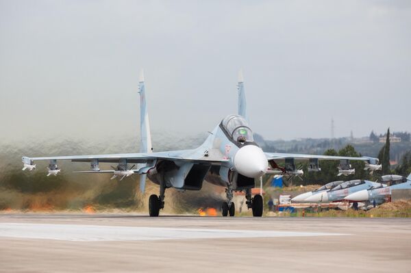 Истребители Су-27 ВКС России на авиабазе Хмеймим в Сирии Истребители Су-27 ВКС России на авиабазе Хмеймим в Сирии