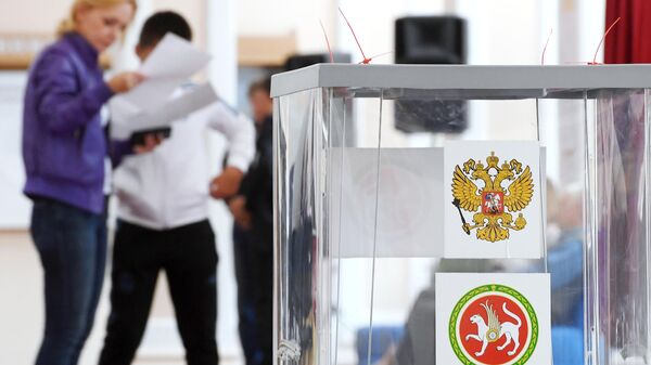 Избиратели на избирательном участке №42 в единый день голосования в Казани