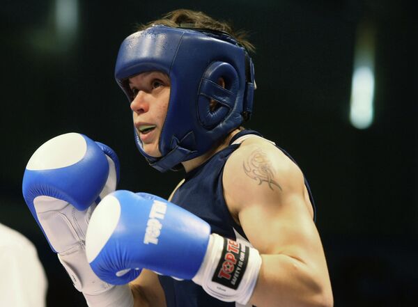 Гладкова Олеся, одержавшая победу в финале чемпионата России по боксу среди женщин в весовой категории до 51кг. Гладкова Олеся, одержавшая победу в финале чемпионата России по боксу среди женщин в весовой категории до 51кг.