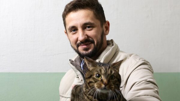 Михаил Галин с котом Виктором Михаил Галин с котом Виктором