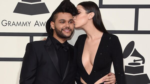 The Weeknd и Белла Хадид на ежегодной премии Grammy music Awards в Лос-Анджелесе The Weeknd и Белла Хадид на ежегодной премии Grammy music Awards в Лос-Анджелесе