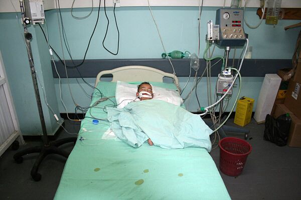Палестинский ребенок, пострадавший в ходе израильской операции в секторе Газа Палестинский ребенок, пострадавший в ходе израильской операции в секторе Газа