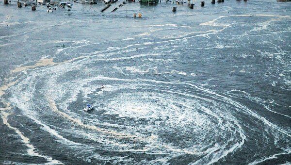 Последствия землетрясения и цунами в японском городе Оарай Последствия землетрясения и цунами в японском городе Оарай