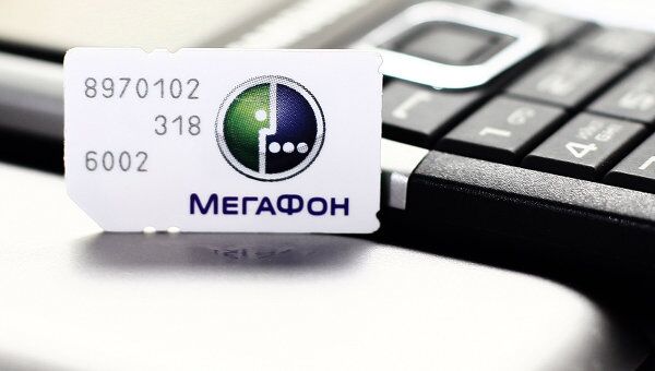 Сим-карта с логотипом оператора сотовой связи Мегафон. Архив Сим-карта с логотипом оператора сотовой связи Мегафон. Архив