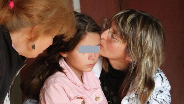 Девятилетняя Даша Попова, которая было похищена 19 сентября 2012 года у своего дома в Ростове-на-Дону. Девятилетняя Даша Попова, которая было похищена 19 сентября 2012 года у своего дома в Ростове-на-Дону.