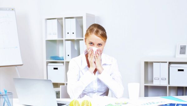 Woman struggling with the flu Woman struggling with the flu
