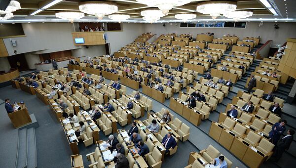 Депутаты на пленарном заседании Государственной Думы РФ. Архивное фото Депутаты на пленарном заседании Государственной Думы РФ. Архивное фото