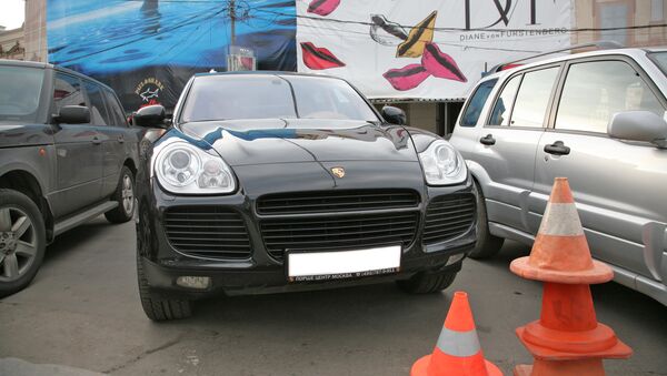 Автомобиль Porsche Cayenne. Архивное фото Автомобиль Porsche Cayenne. Архивное фото