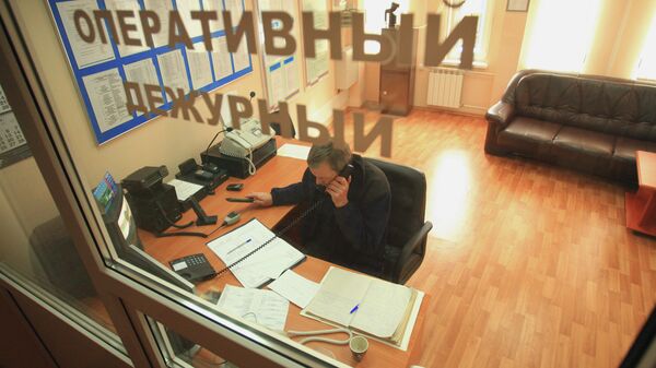 Работа оперативного дежурного. Архивное фото Работа оперативного дежурного. Архивное фото