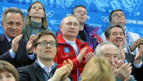 Президент России Владимир Путин (в центре) на XXII зимних Олимпийских играх в Сочи. Архивное фото Президент России Владимир Путин (в центре) на XXII зимних Олимпийских играх в Сочи. Архивное фото